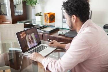 Person receiving online psychotherapy at home